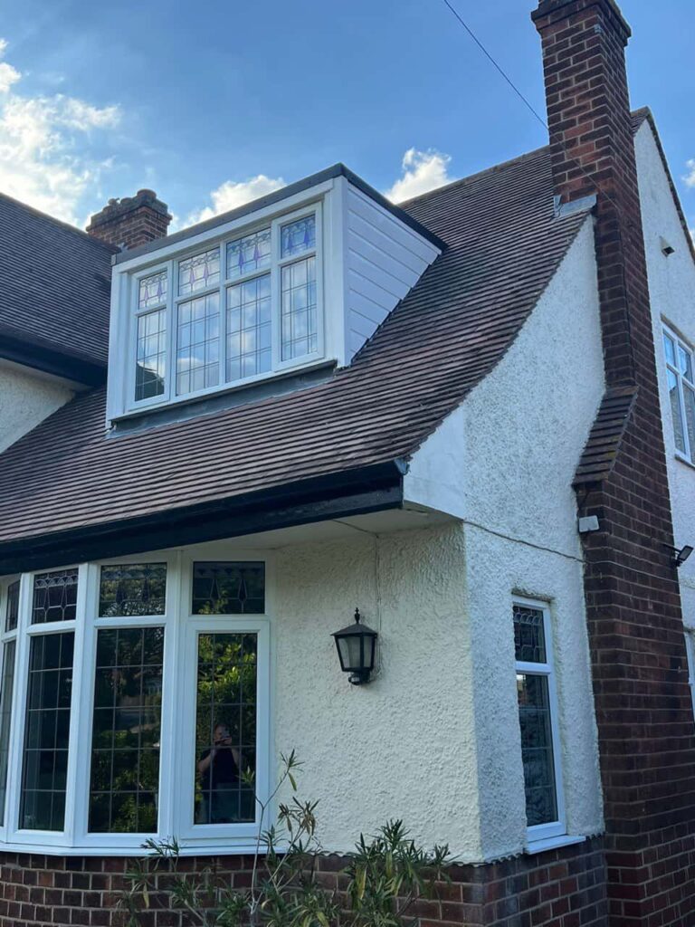 This is a photo of a dormer window which has just had some repairs carried out where the roof and the dormer meet. Works carried out by Bilston Roofing Repairs